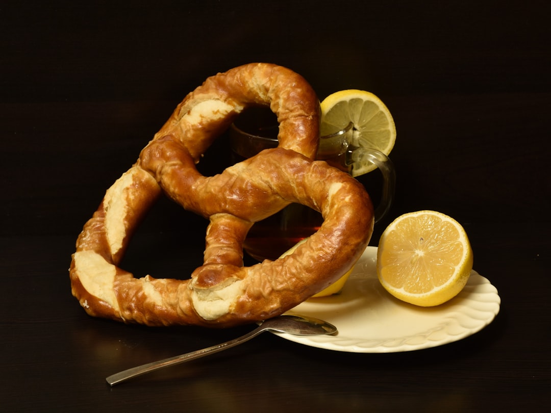 a-pretzel-with-lemon-slices-and-tea-elks5dkbgau